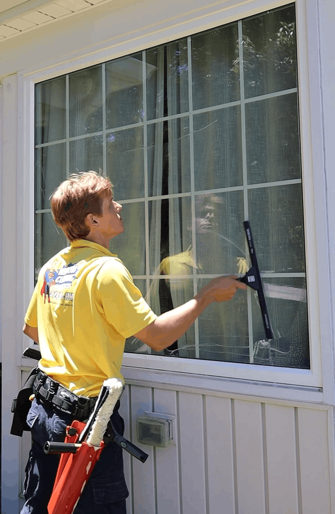 Aqua Shine professional window cleaning team member